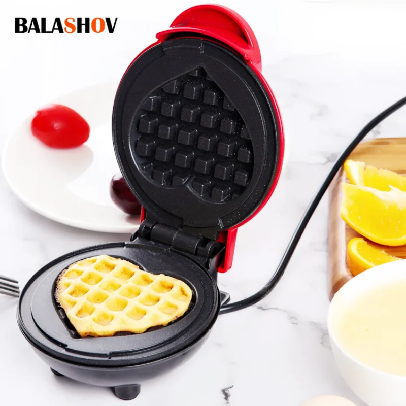 kf-S13f2c50edebb4ef9b4e6a02a9a414cca2 Mini Electric Waffles Maker Bubble Egg Cake Oven Breakfast Love Heart Shaped Waffle Maker Cooking Appliance 220V EU Plug - Image 1